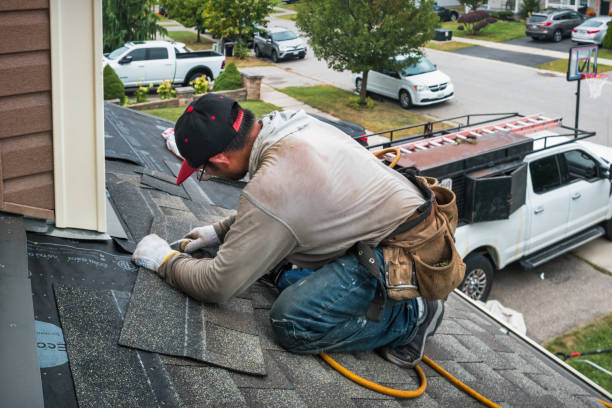 Professional Flat Roof Repair technician working in Greenfield, MA